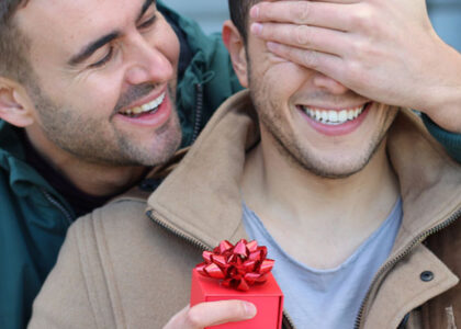man proposing to boyfriend covering eyes