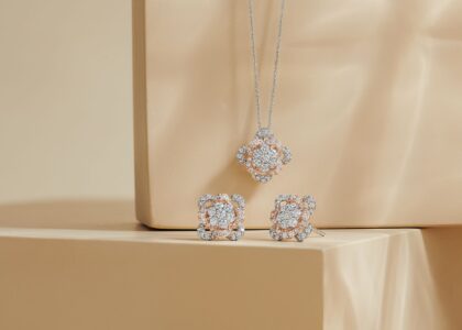 white and rose gold floret diamond pendant and stud earrings