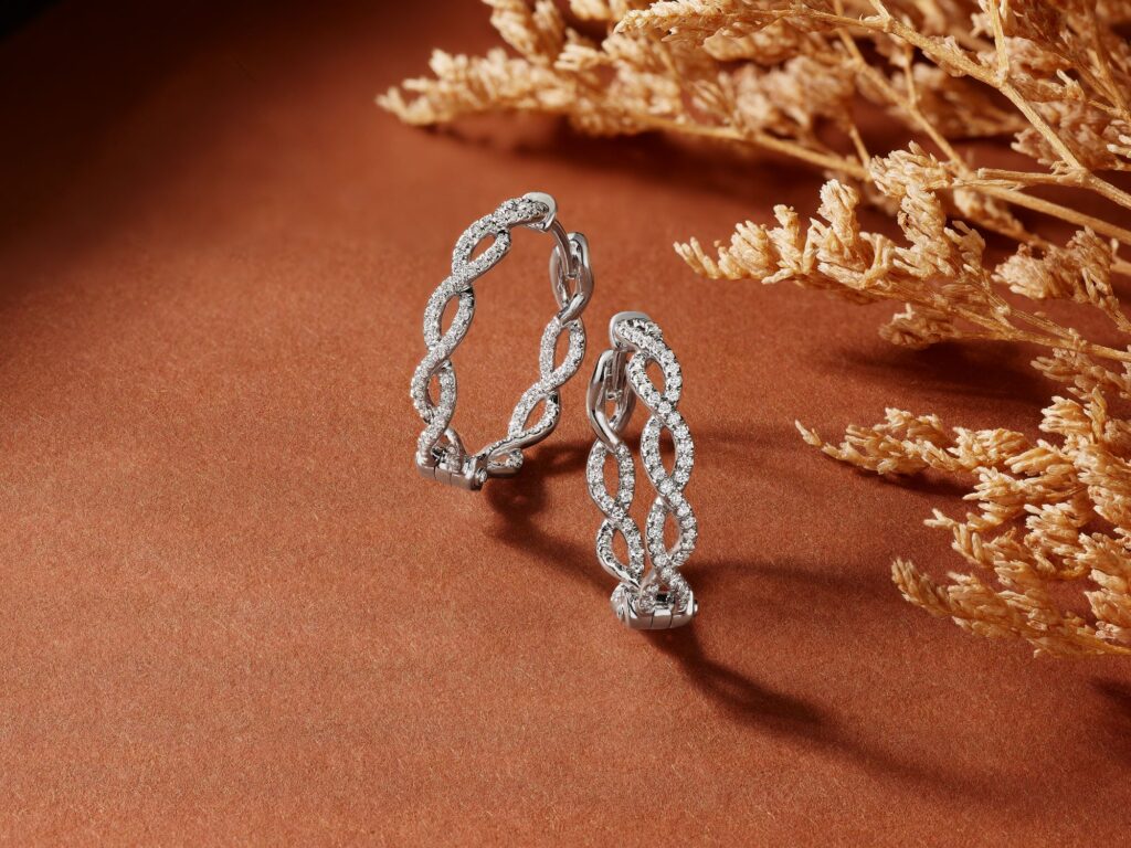 braided gold and diamond hoop earrings