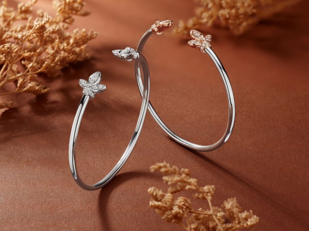 Two bangle bracelets in white gold with diamonds